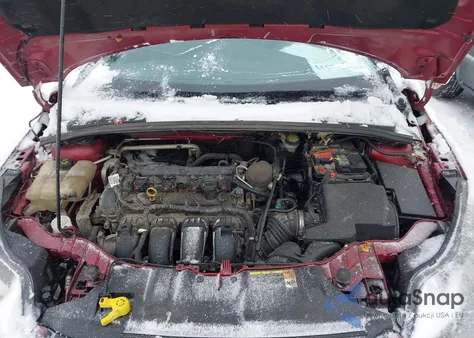 2014 Ford Focus Titanium z USA, uszkodzony, nr VIN 1FADP3J26EL193121